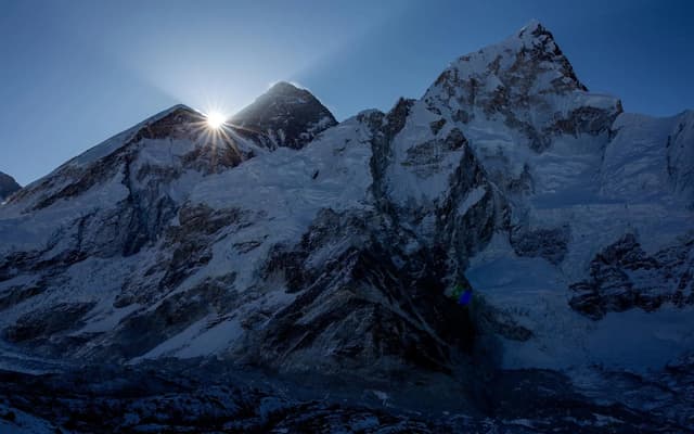 Sunrise lighting the summit of Mount Everest seen from Kala Patthar viewpoint
