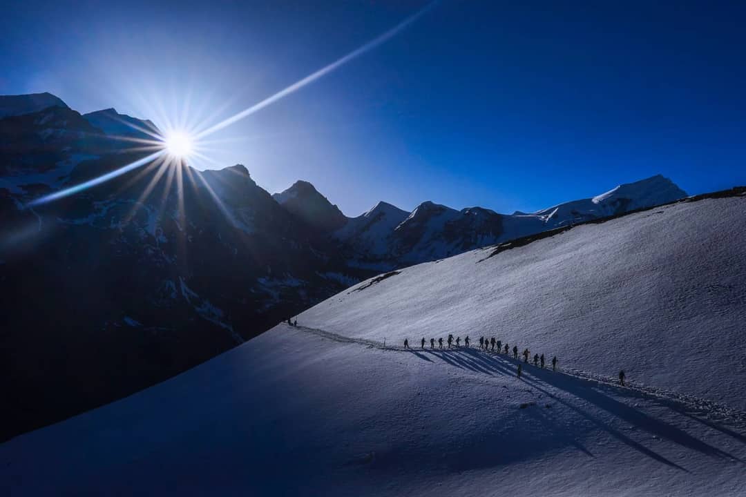 Trekkers crossing Thorong La Pass on the Annapurna Circuit