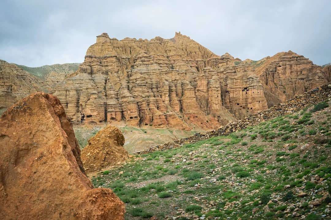 Empty road and cliffs in Upper Mustang