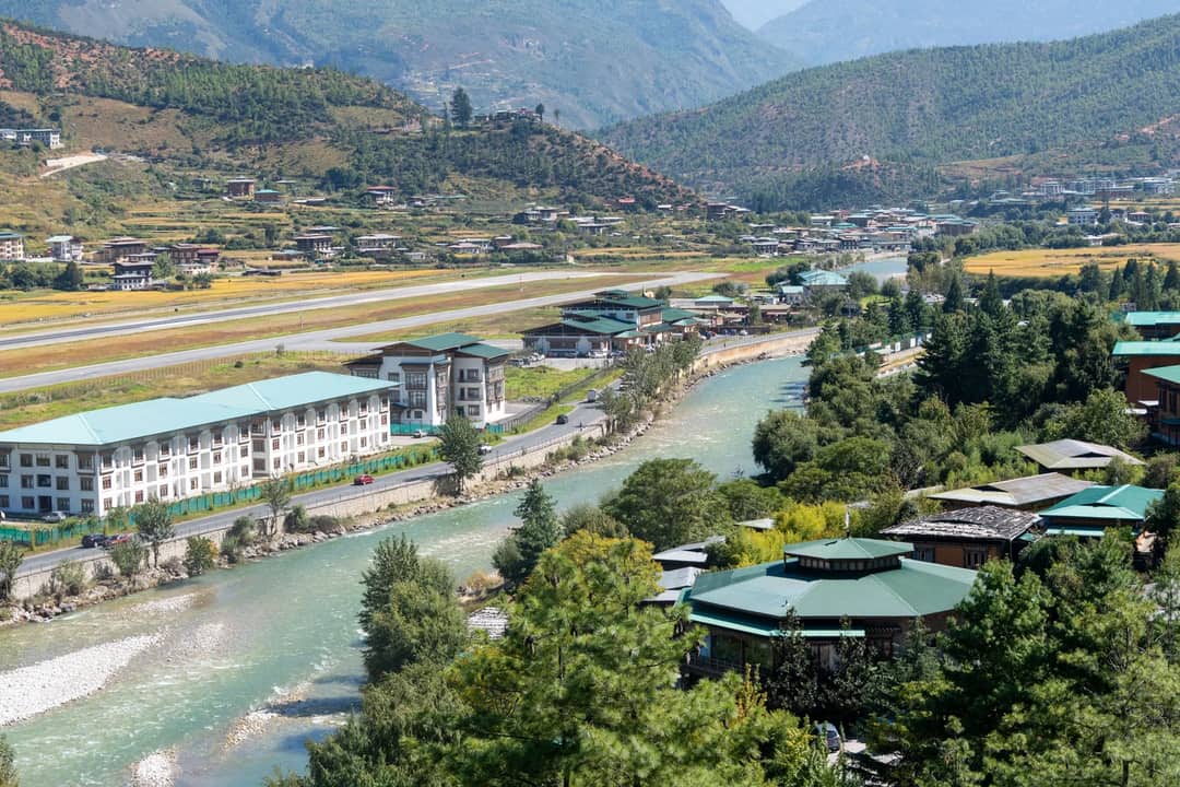 A breathtaking aerial view of Paro Valley, showcasing the picturesque landscape of Bhutan.