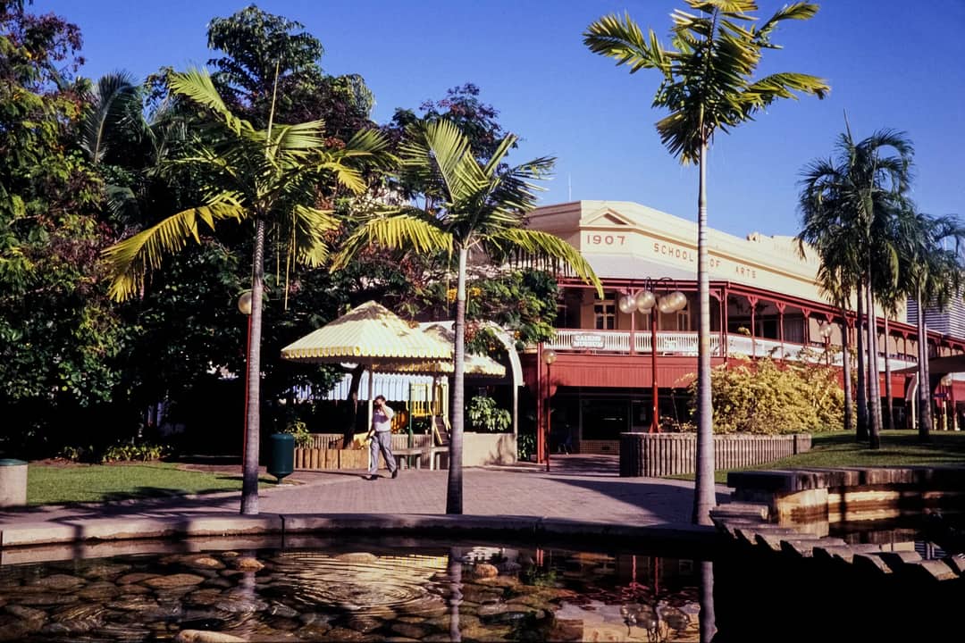 The 1907 School of Arts building with palm trees in Cairns, Queensland, Australia.