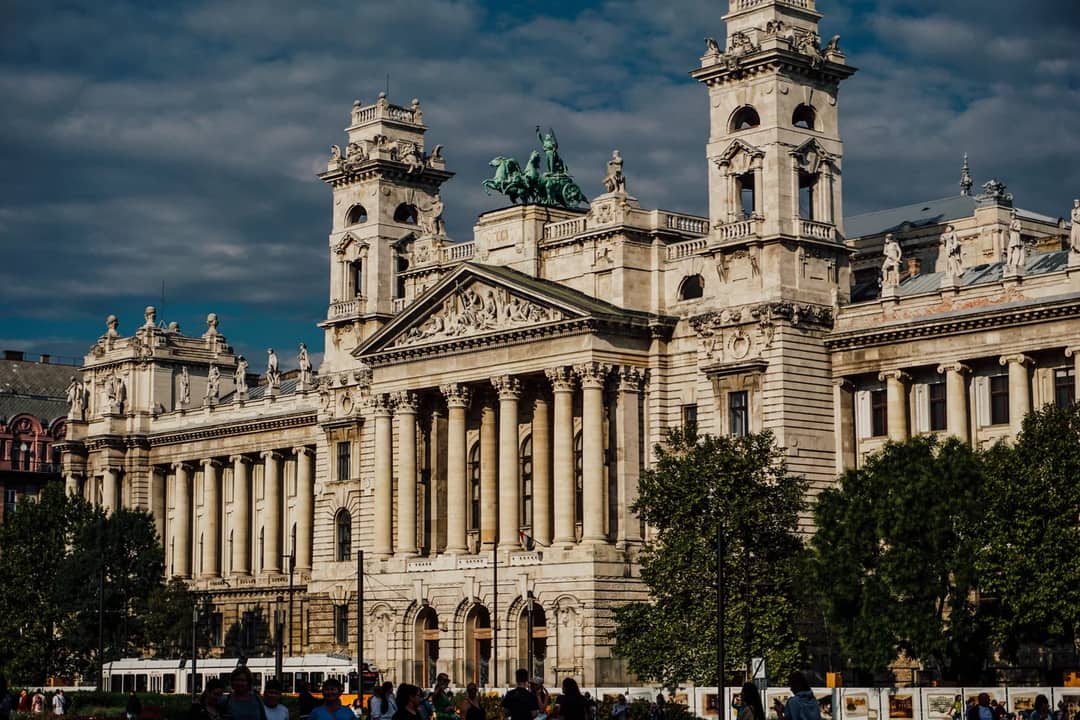 The grand exterior of the Museum of Ethnography in Budapest, Hungary, with classical pillars and architectural details.