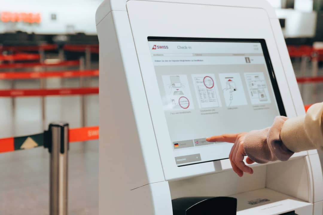 A boarding pass and travel documents
