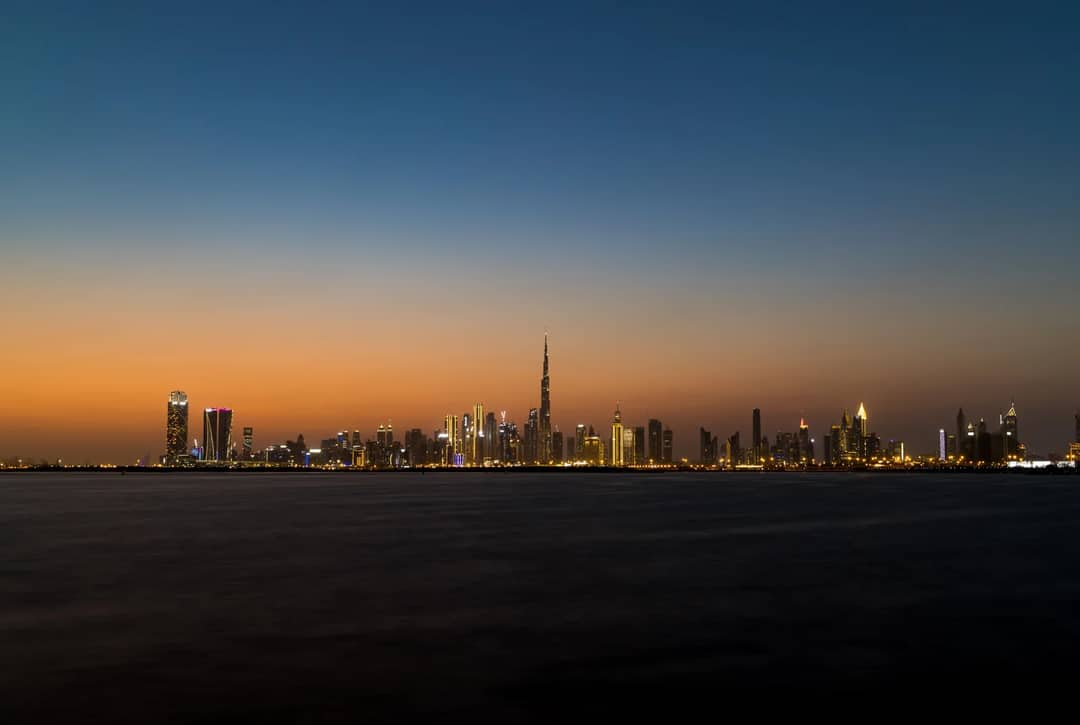 Stunning view of Dubai's skyline at twilight featuring the iconic Burj Khalifa.