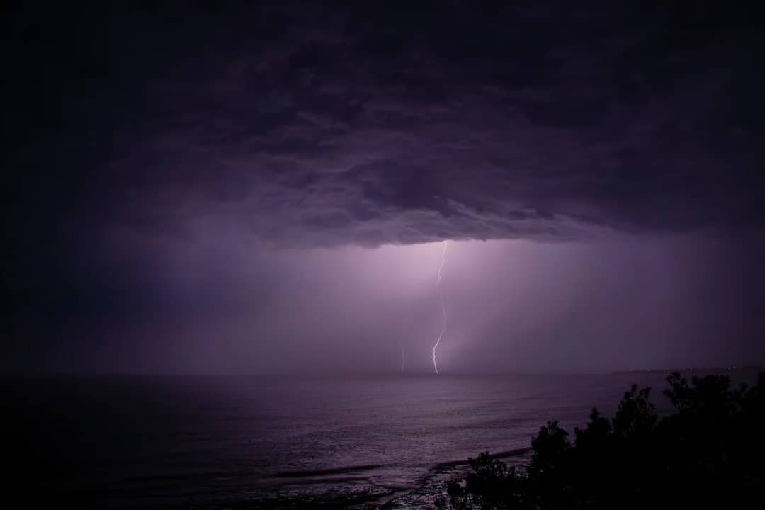 Dramatic lightning storm captured over the ocean at Culburra Beach, NSW, Australia.