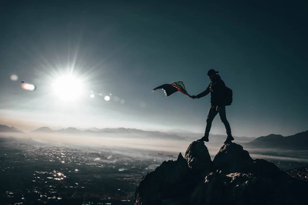 A climber on a summit