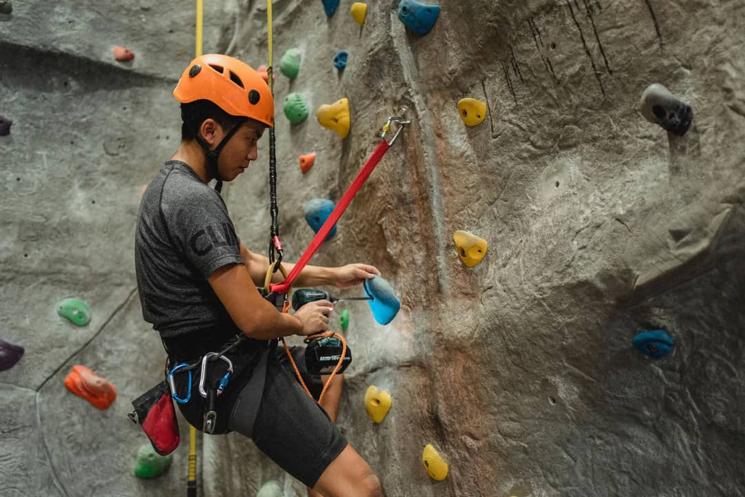 A climber on a fixed rope on an ice wall