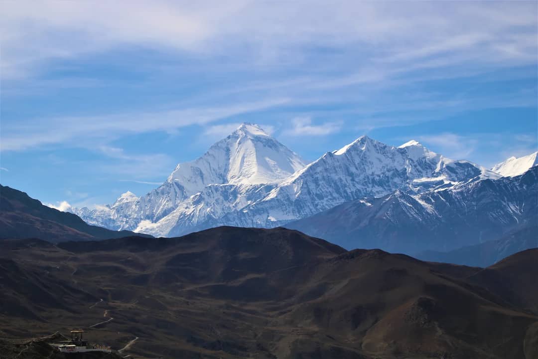 A breathtaking view of Mount Dhaulagiri in the Himalayas, captured from Tanki Manang, Nepal.