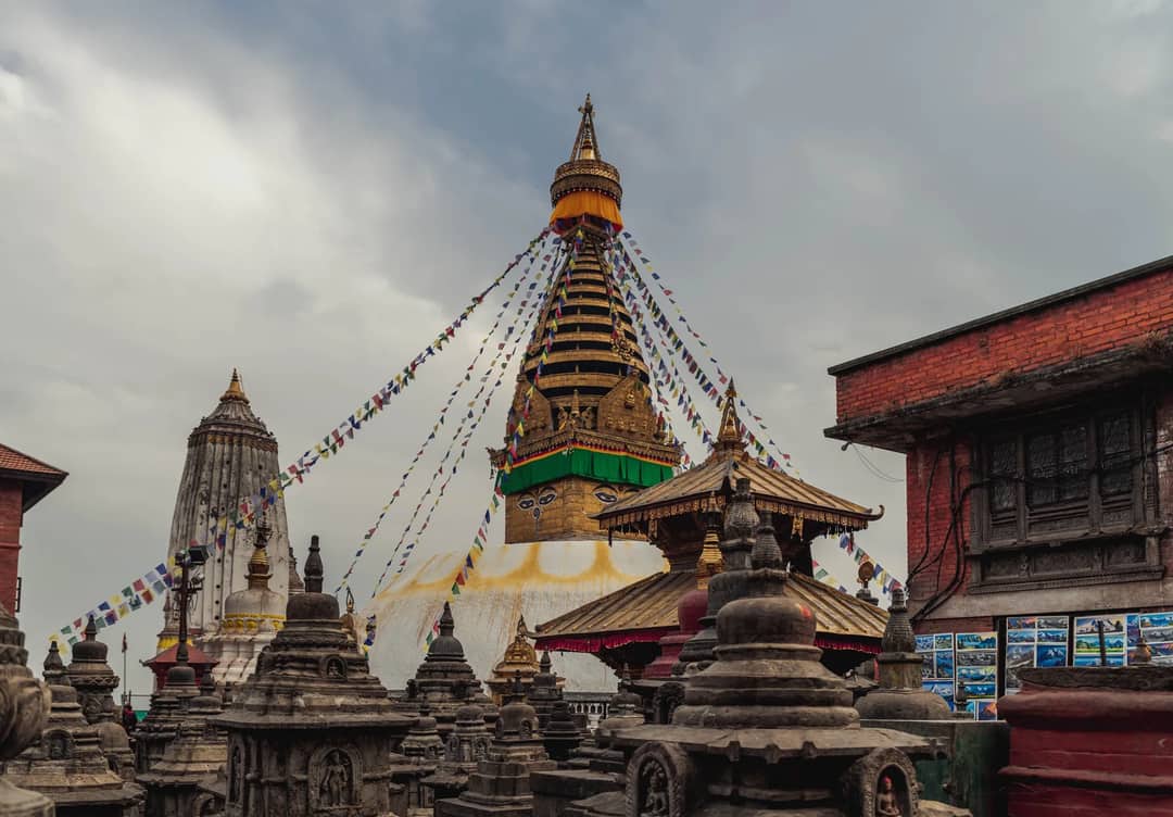 Explore the iconic Swayambhunath Stupa with its colorful prayer flags in Kathmandu, Nepal.