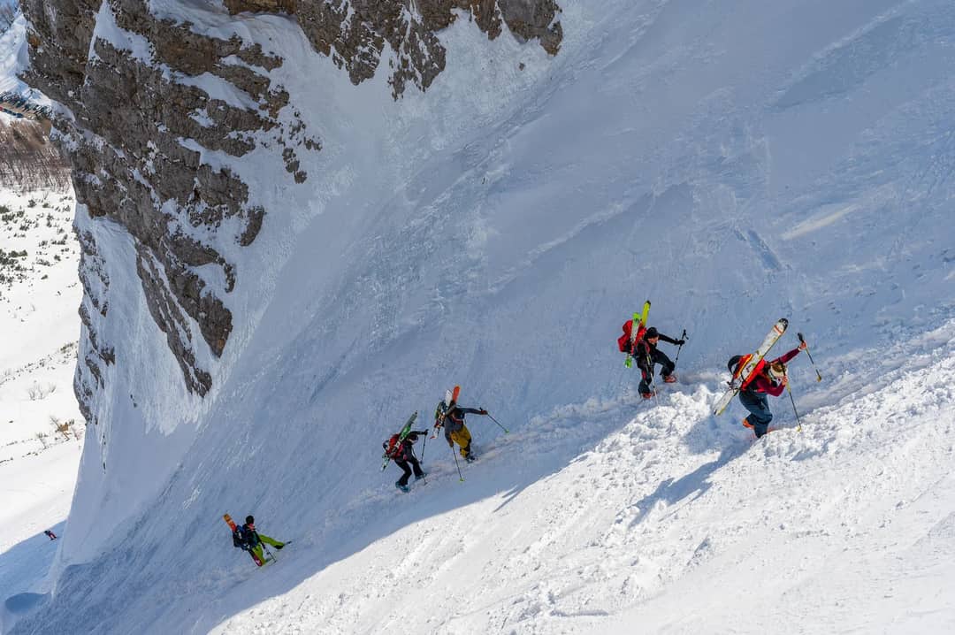 A steep ice couloir of the kind climbers must pass slowly and without shelter