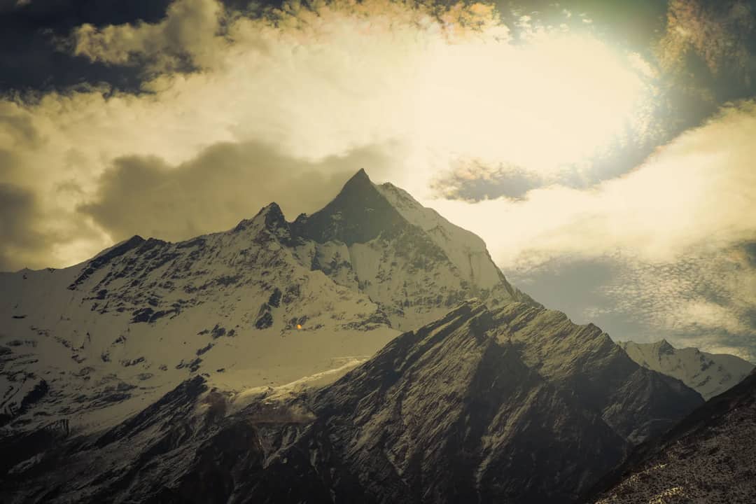Mount Annapurna with dramatic clouds and snow-capped peaks in Nepal