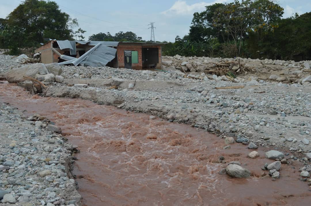 Flood damage along a river valley