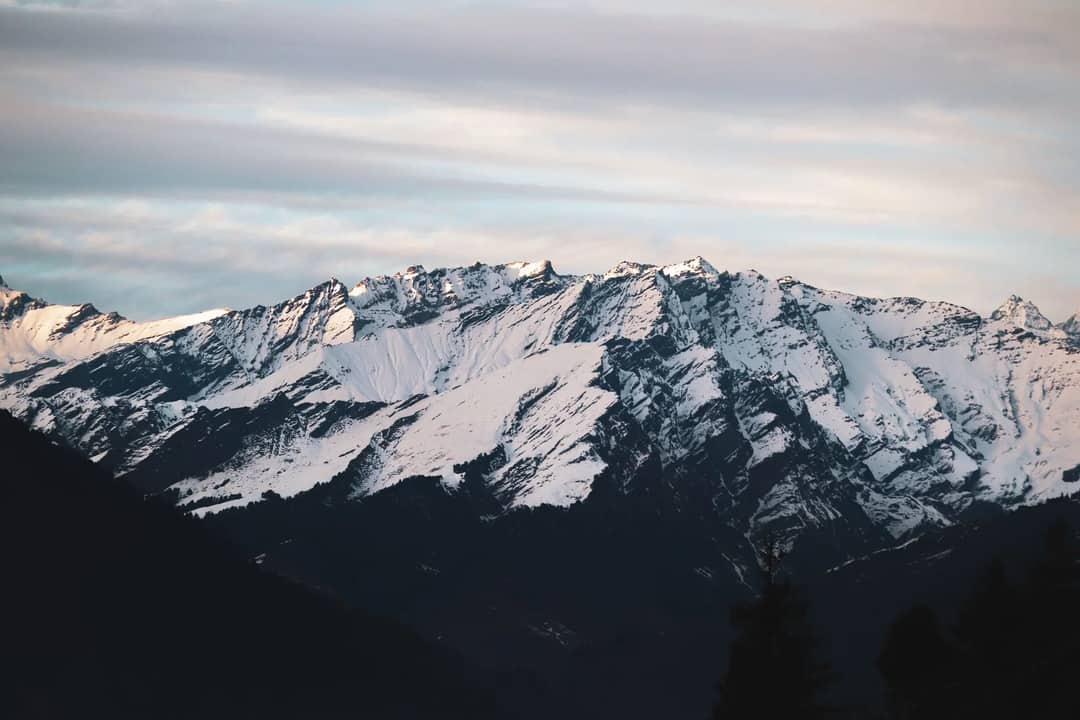 A line of snow peaks along a high ridge
