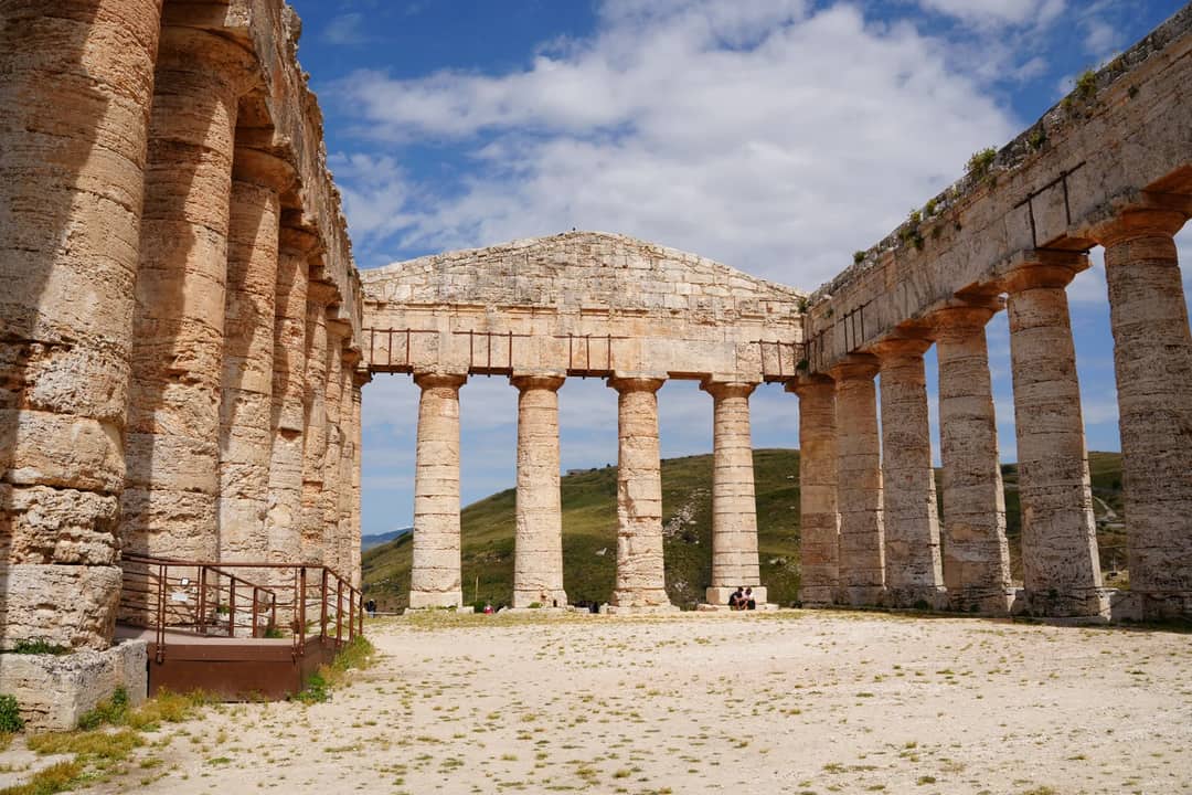 Stunning view of the ancient Doric temple in Segesta, Sicily, on a sunny day.