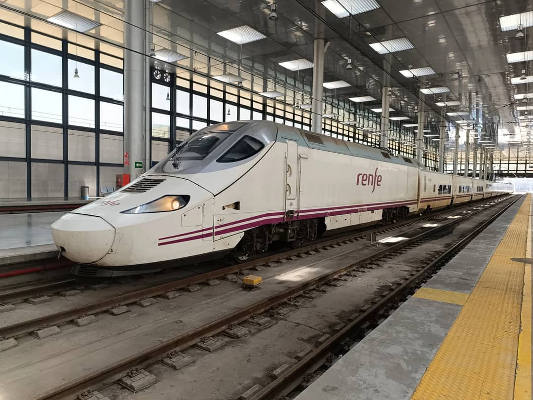 A high-speed train at a station platform in Spain