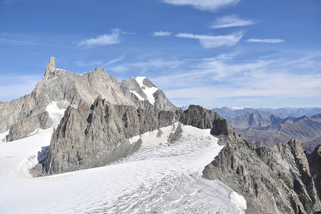 Majestic view of snowcapped Dent du Géant in the Mont Blanc Massif, perfect for travel and nature photography.
