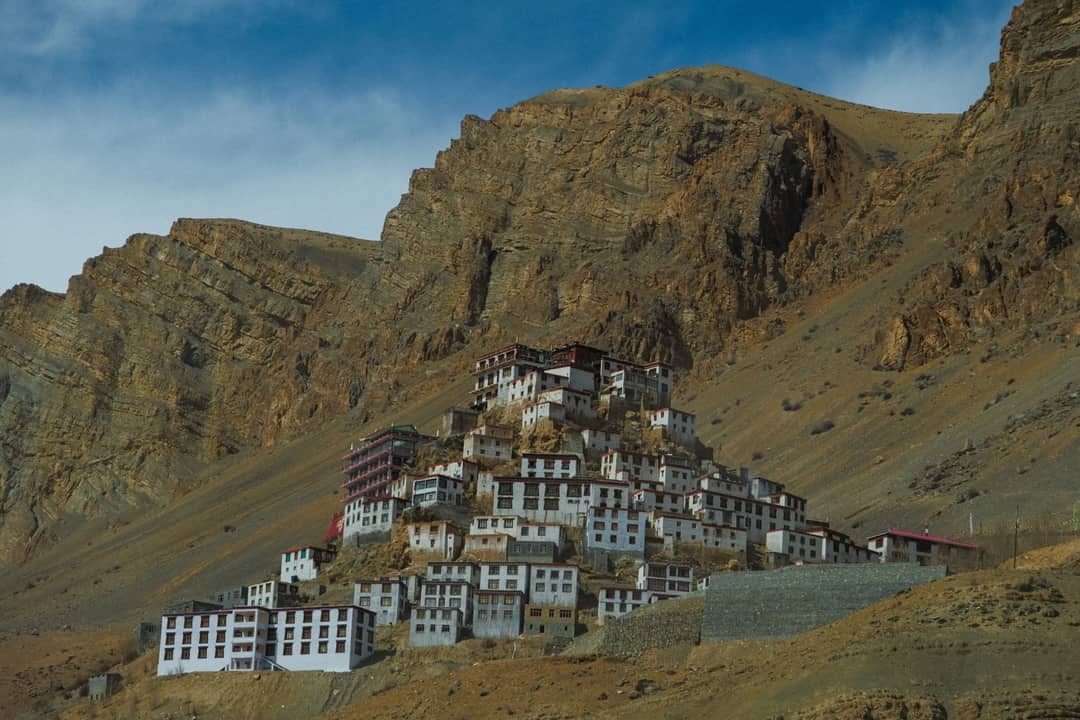 Key Monastery nestled in the rugged hills of Spiti Valley, showcasing stunning Buddhist architecture.