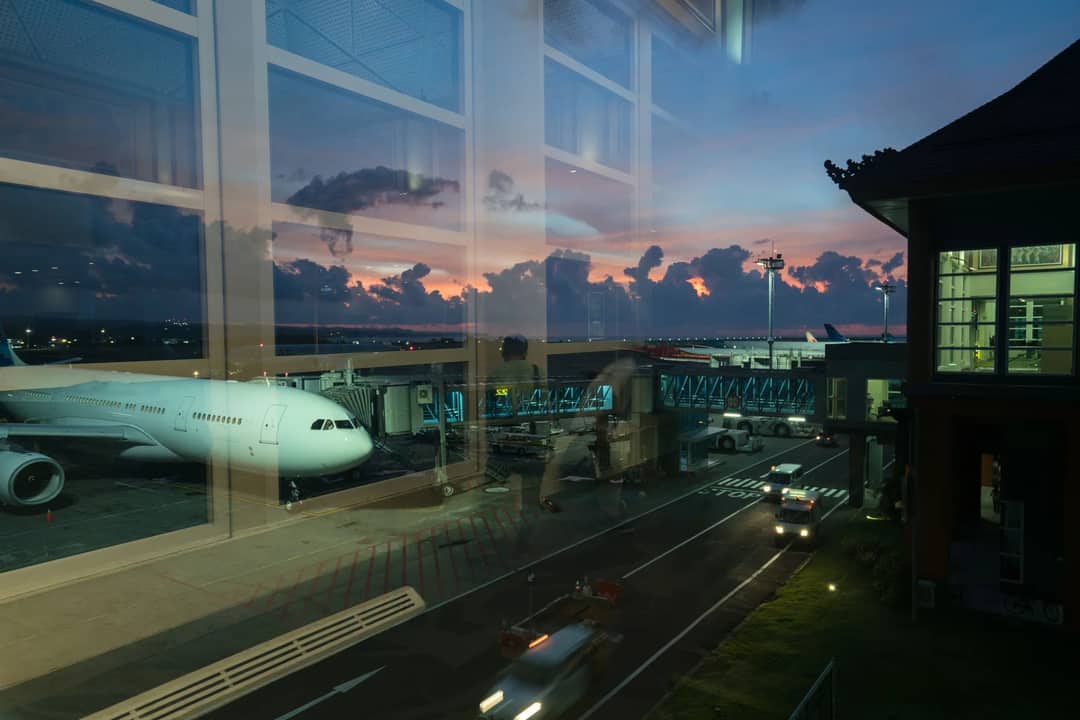 An aircraft at its gate seen from the terminal