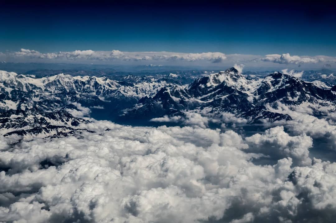 High Himalayan peaks seen from the air, with no low ground visible in any direction