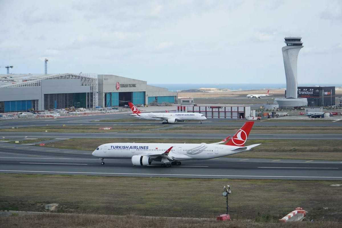 Turkish Airlines planes on the runway at Istanbul Airport
