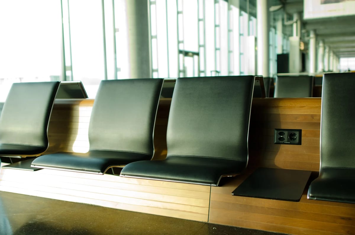 Quiet airport seating area with sunlight