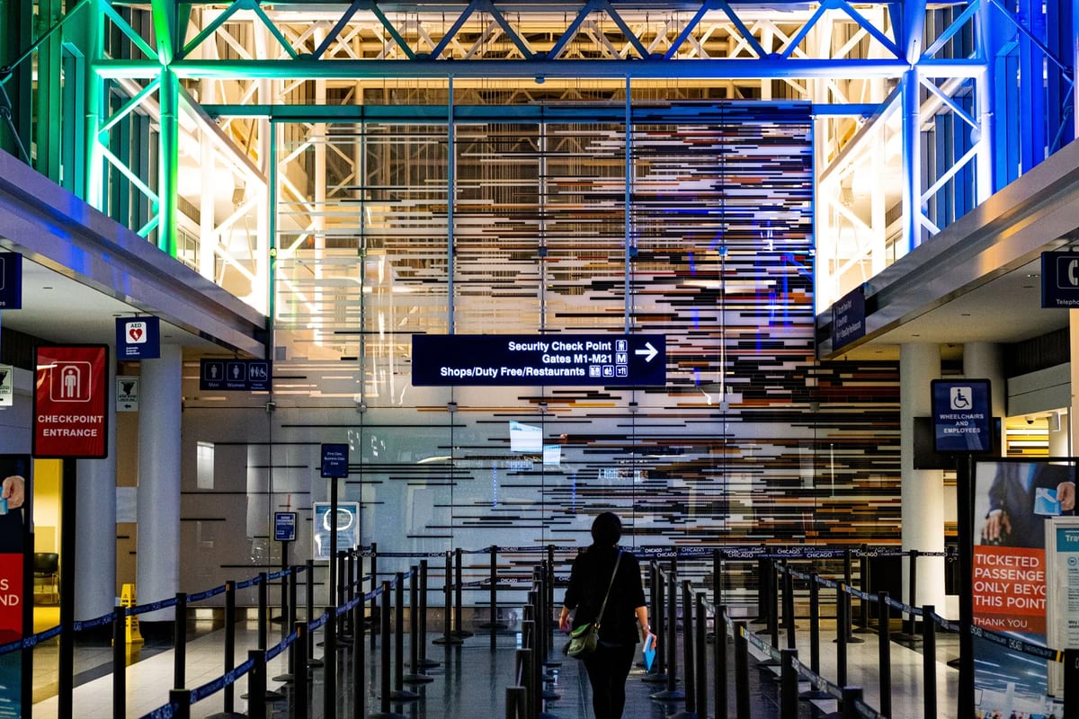 Traveller at the security checkpoint at O'Hare