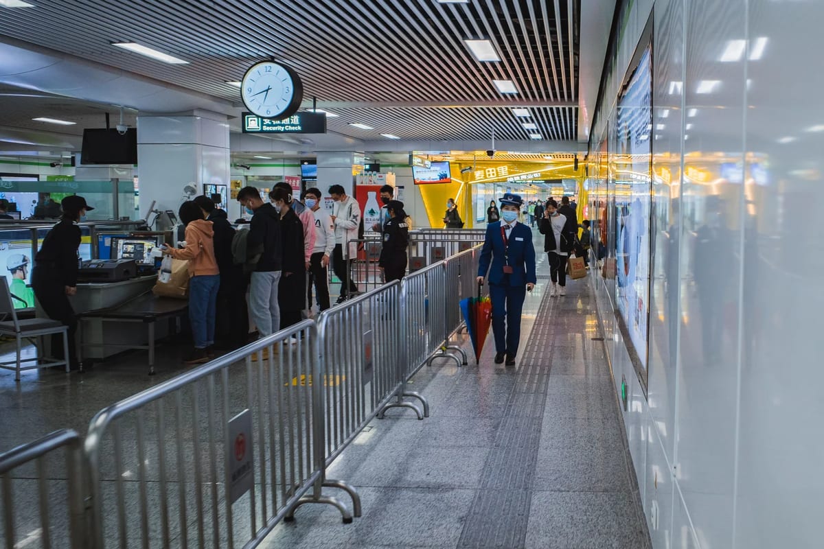 Travellers passing through airport security