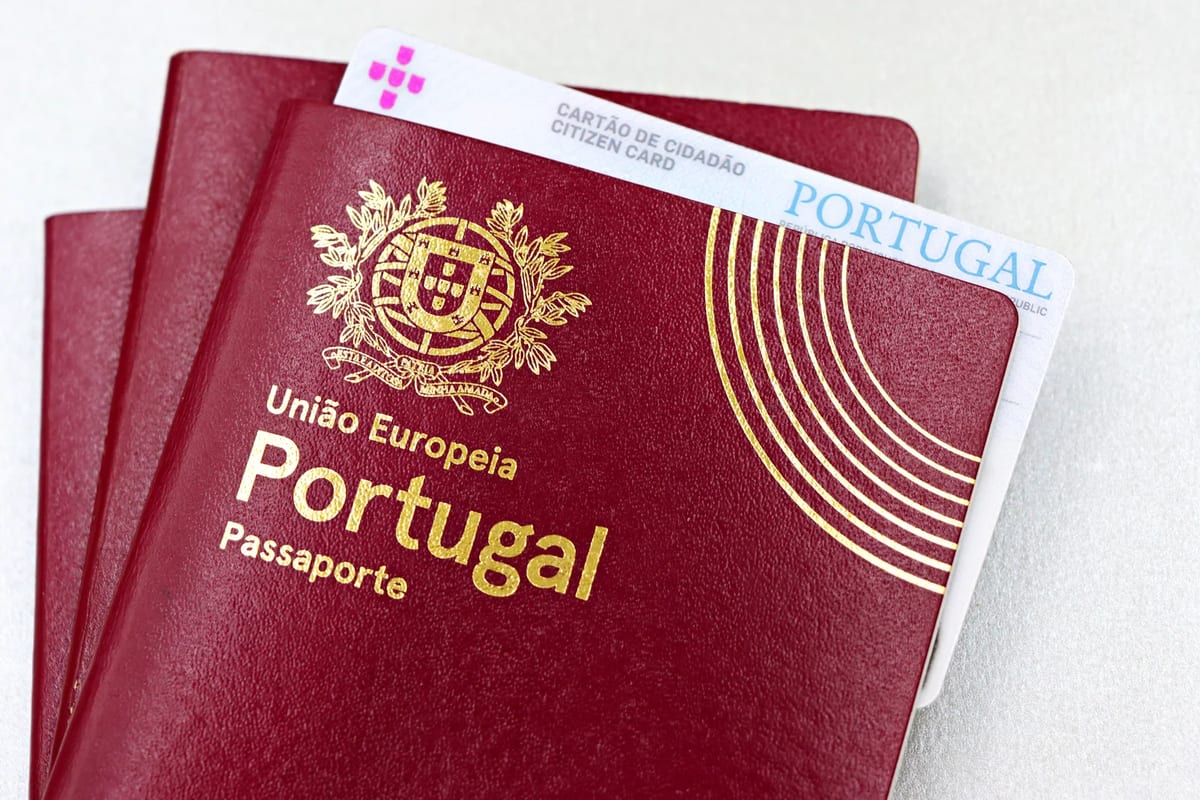 A passport and a card on a table