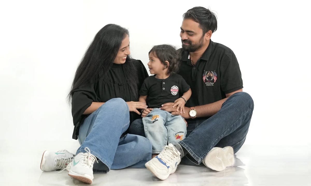A family sitting together and smiling