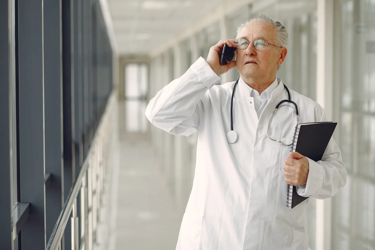 A doctor with a stethoscope and notebook