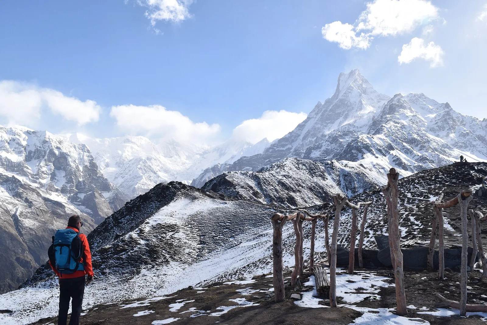Solo female trekker on mountain trail Nepal Annapurna region safe hiking