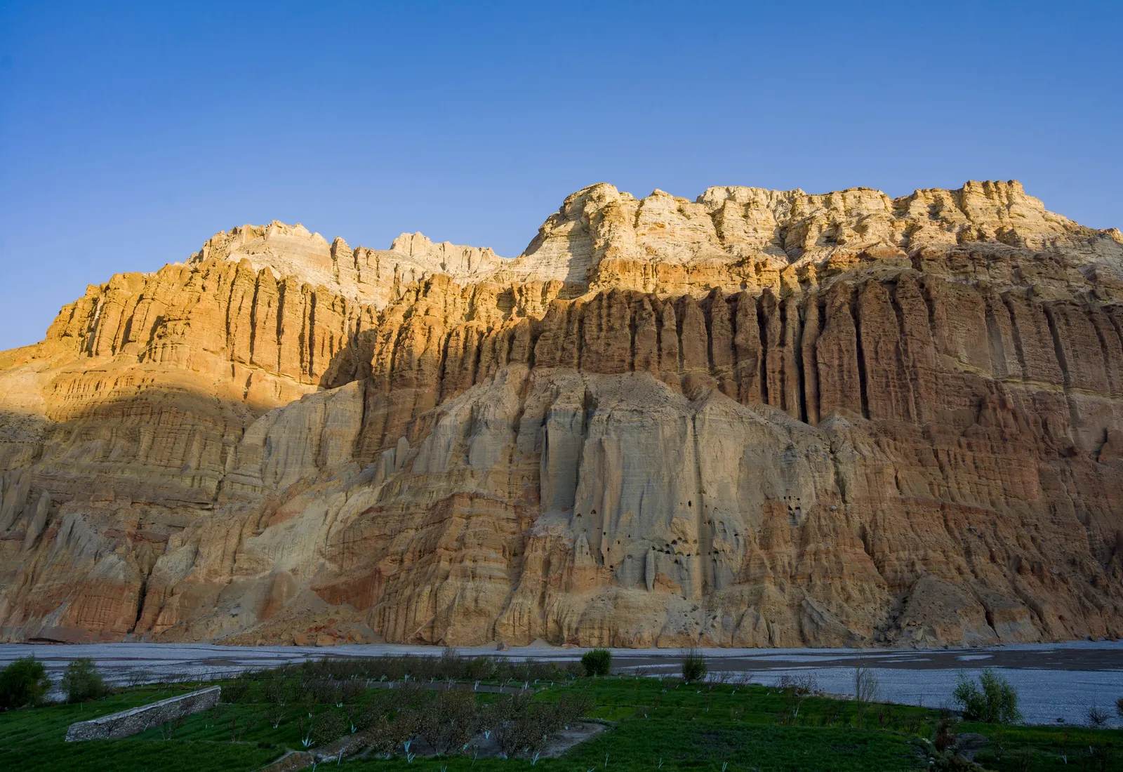 Eroded golden cliffs near Lo Manthang in Upper Mustang