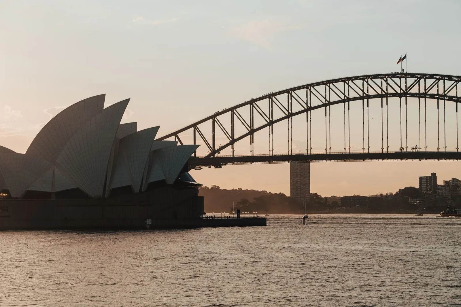 The Sydney Opera House and Sydney Harbour Bridge on Sydney Harbour, Australia — every short-stay visitor needs an entry authorisation before they fly