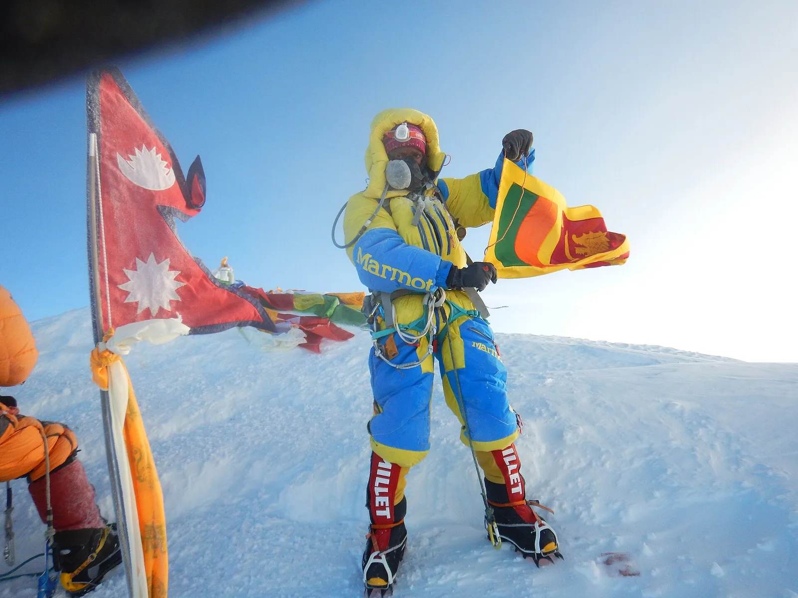 Mount Everest summit ridge with climbers — record spring 2026 season, Nepal Himalaya