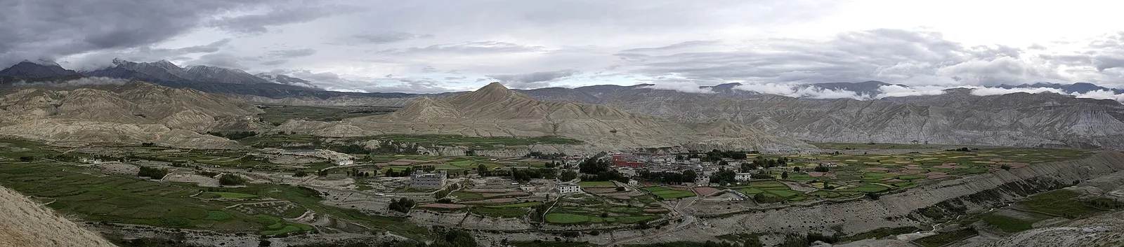 The arid rain-shadow landscape of Upper Mustang near Lo Manthang — monsoon-season trekking, Nepal