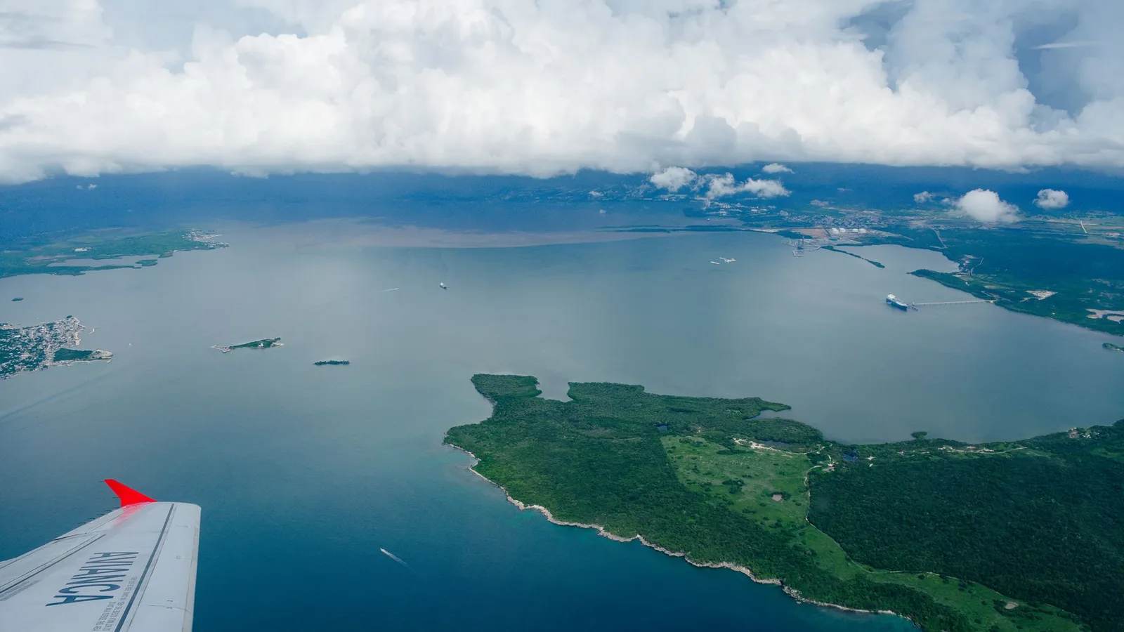 A tropical coastline under clouds, no Atlantic hurricane has formed yet in 2026