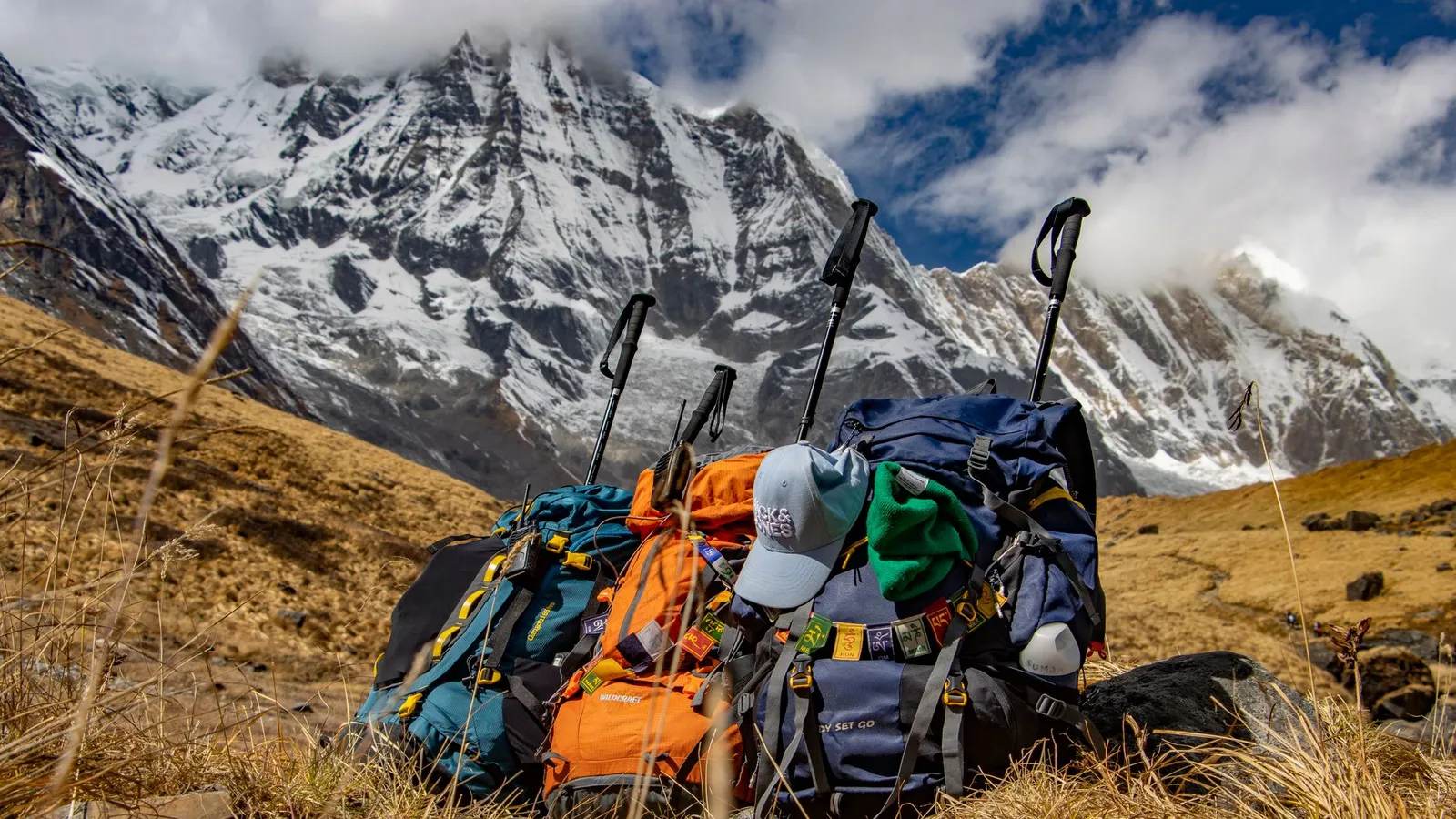 Trekking gear and equipment laid out for a Himalayan trek in Nepal