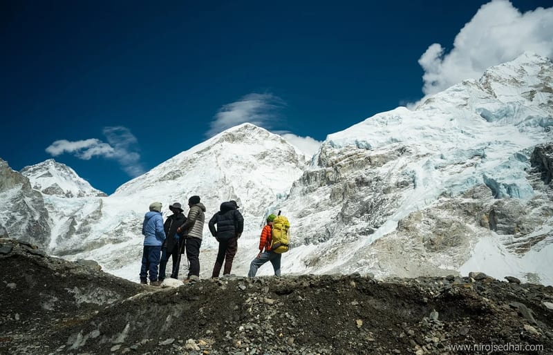 Trekkers crossing the Khumbu Glacier moraine