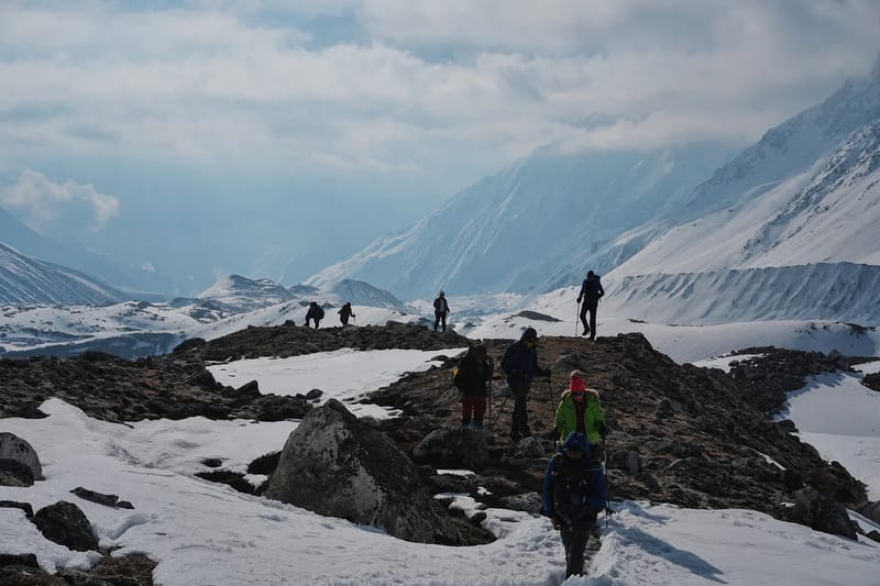 Trekkers approaching Larke Pass on the Manaslu Circuit